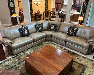Tan “Natuzzi like” 5 piece sectional w 2 recliners. 10’L each way, 39” d 36”t
$ 2,500.00