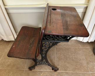 Old school desk 28”w 21”d 26.5”t wood and cast iron. $150.00