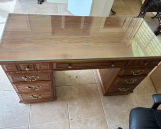 Desk faux wood finish glass top 9 drawers. 52”w 22”d 30.5”t $ 75.00