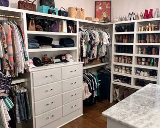Lots of clothing, shoes, bags and jewelry