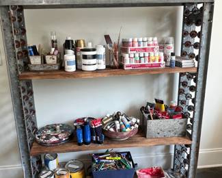 Industrial shelf made of old conveyor belt and tons of Art supplies