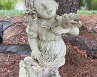 Resin girl with birds statue