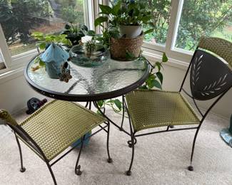 Round metal table with 2 all-season wicker and metal chairs