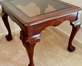 Cherry wood accent table with smoky brown glass
