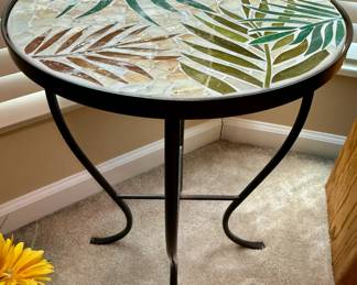 Metal  accent table with glass leaf pattern top