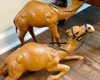 Vintage leather-wrapped camel figurines