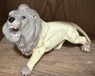 Porcelain lion figurine