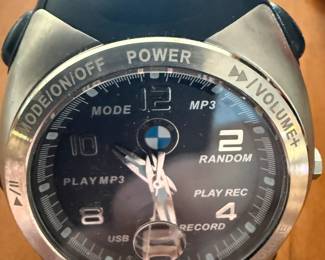 Classic BMW Watch with MP3, Random, Play Rec, Record, USB, Play MP3,Modej all on the Face of the Watch with: Power, Volume, +-,  Charge, Delete, Mode On/Off on Rim of Watch Crystal and MP3 Connector on Wrist Band