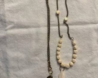 Brass Chain and Accent Beads, Handmade Closure and Charm Bone Feather and Hexa Gona Beads plus Circular Horn Beads.