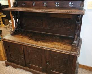 Antique English Gothic cabinet. From 1600-1700's. Available for pre-sale $2,000. Approx. Dimensions 52 x 54 x 21. 