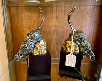 Striking pair of brass and enamel Jaguar bookends