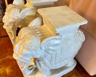 two elephant plant stands