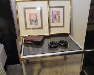 Smoked glass and metal side table.