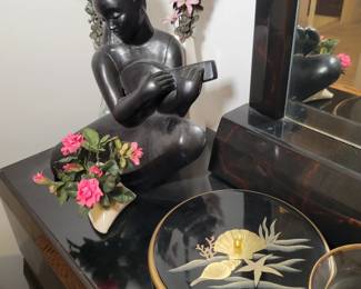 Asian statue and round lacquer box.