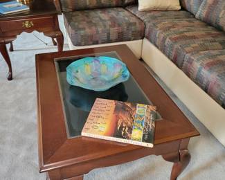 Traditional coffee table with sliding top.