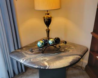 Modern corner coffee table with stone top.