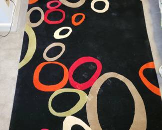 Graphic area rug. Approx 5x8.