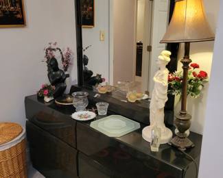 Black lacquer with red stylization dresser with mirror.