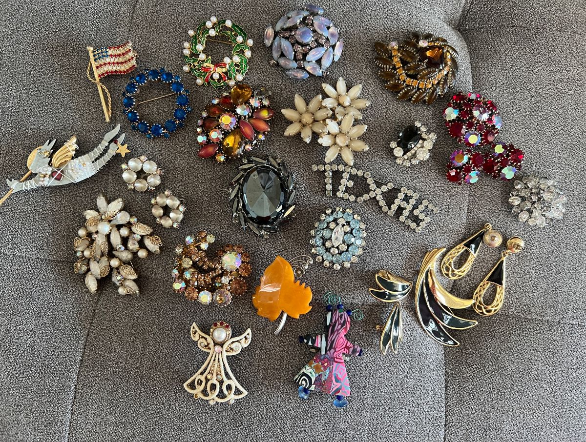 Just some of the great brooches you will find at this home most are vintage. Some are newer.