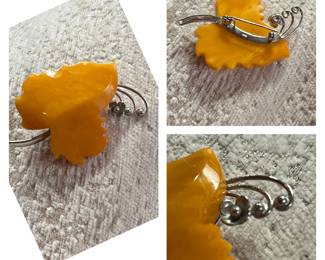 RARE Vintage Amber butterscotch brooch. Made in the USSR.. This is Baltic Amber. There is a Hallmark on the back. Seen online for a minimum of $250 to $480,