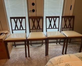 There are six of these wooden folding chairs