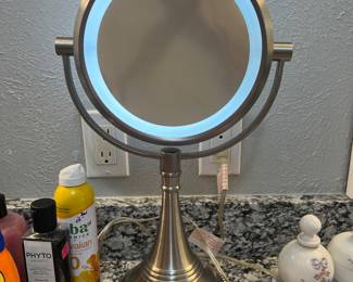Two a make up mirror. One side is magnified.