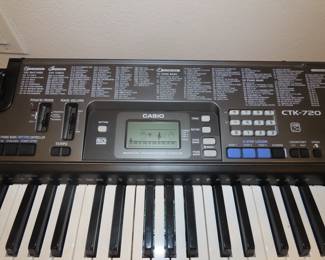 Casio digital keyboard and stand.