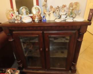 Short curio cabinet.