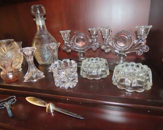 Shelves of porcelain, lead crystal, vintage stemware,