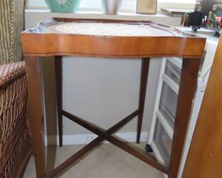 Leather top antique end table.