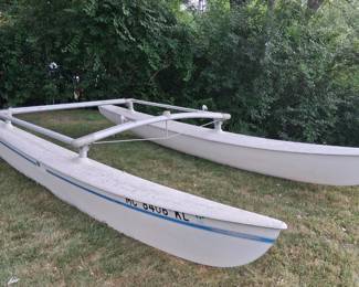 1976 Hobie Cat. The sails, mast, etc are all in good shape. No trailer.
