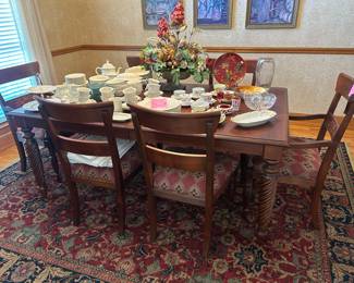 Ethan Allen formal dining table with two leaves and eight chairs almost new!