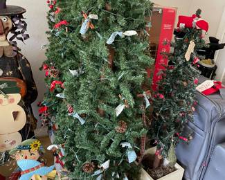 Lots of holiday decor. Christmas trees.
