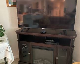 Entertainment center with a electric fireplace