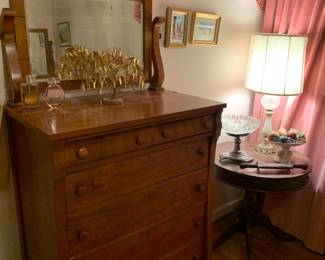 antique dresser and drum table; many lamps
