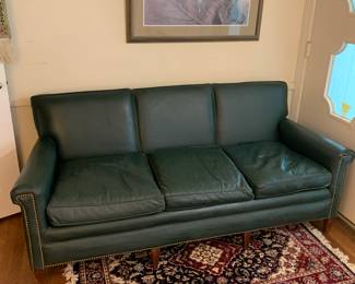 small Mid-Century leather like sofa, rug, artwork