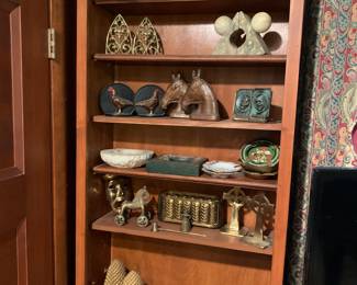 Bookends and brass, ash trays