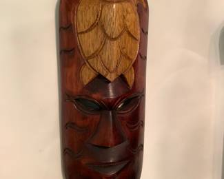 Wooden totem mask with turtle