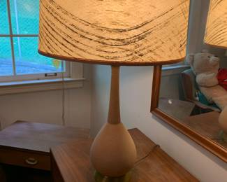 The Mid-century lamp shown earlier but now illuminated