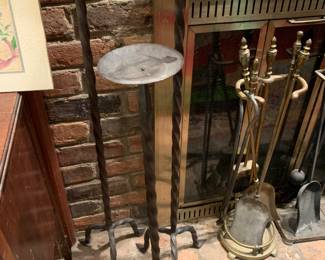 set of three wrought iron candle stands
