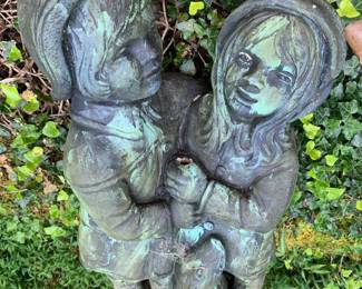 pair of children under umbrella