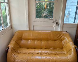 Marigold leather Percival Lafer loveseat
On Brazilian rosewood base