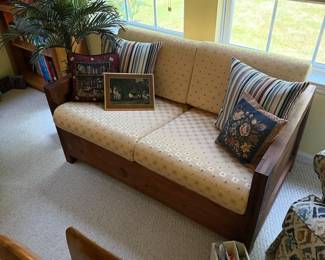 2 seat wooden couch