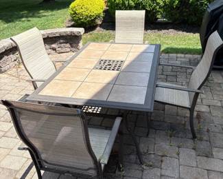 tile top / iron outdoor patio set with 4 chairs