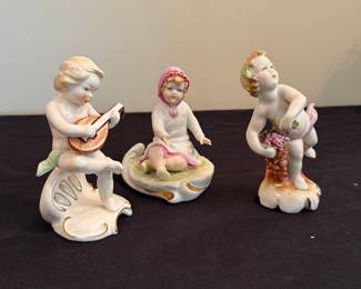 bisque cherub figurines
