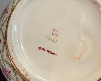 Royal Trianon Hand Painted tumbler beside water carafe