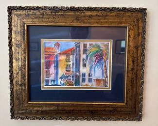 framed watercolor painting of a vibrant street scene