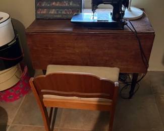 Singer Featherweight sewing machine with case, sewing table
