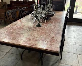 Stone top dining table , 98" x 44", with Baccarat style girandole candelabra 