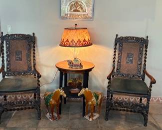 Pair of antique carved and cane armchairs and antique marble base table lamp with mica shade